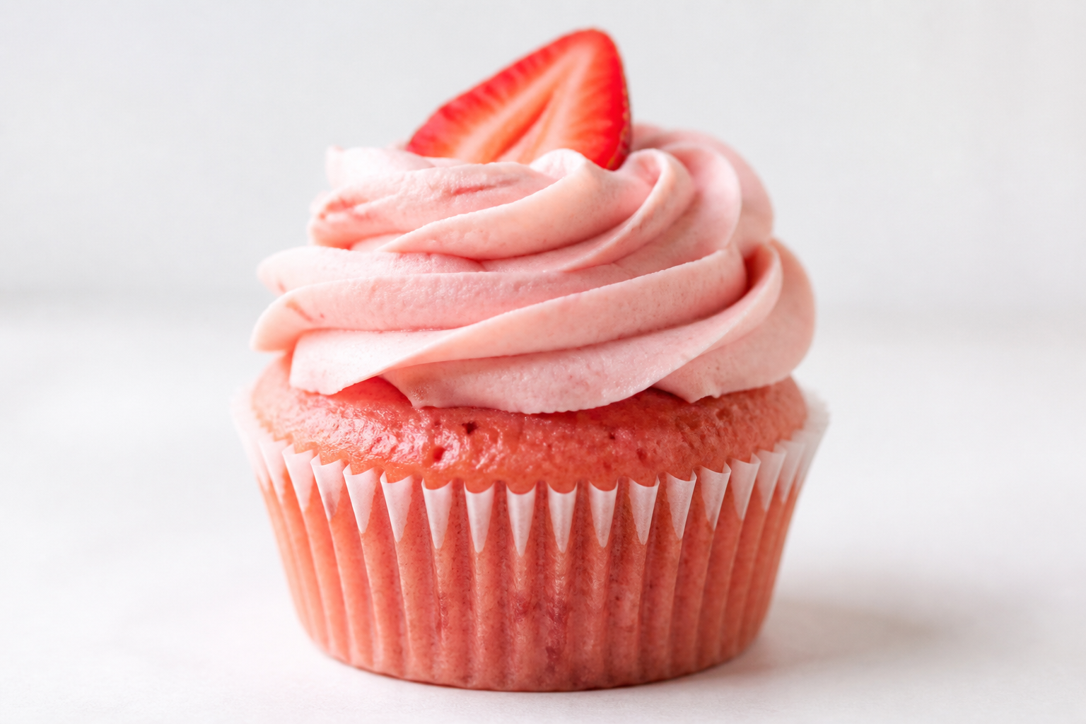Strawberry cupcake with pink strawberry frosting